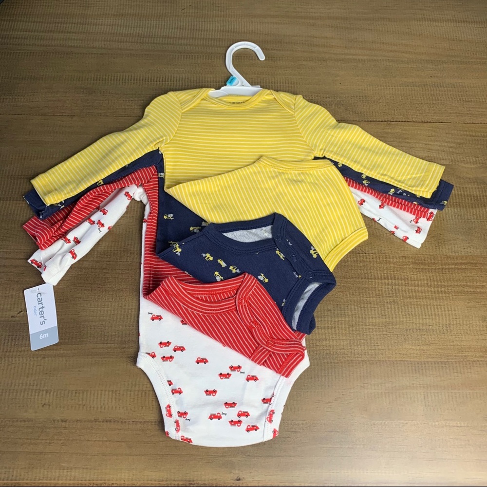 NWT Carter’s 4pc long sleeve onesies